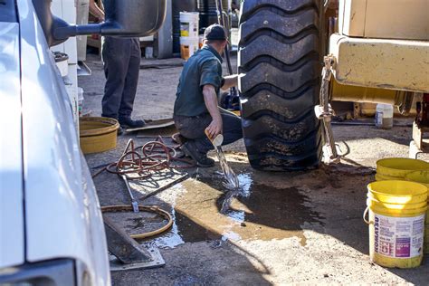 Industrial Tire Installation on Cat Scraper - Complete Step by Step Install