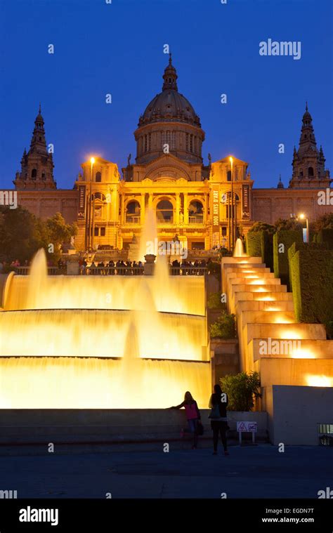 Illuminated fountain and Palau Nacional at night, National Museum, Montjuic, Barcelona ...