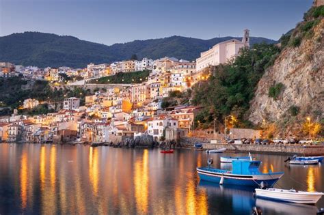 Premium Photo | Scilla italy on the port at dusk