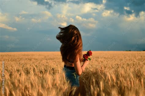Girl With A Naked Back In The Field Blue Sky And Yellow Field Beautiful Girl With Long Hair