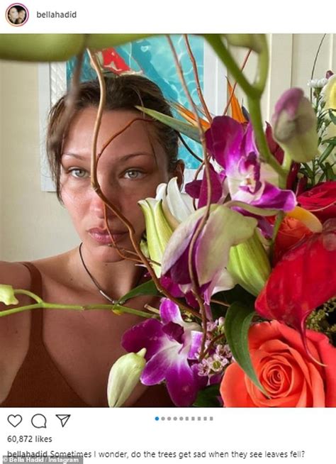 Bella Hadid Soaks Up The Sun In A Neon Bikini While On Tropical Holiday Daily Mail Online