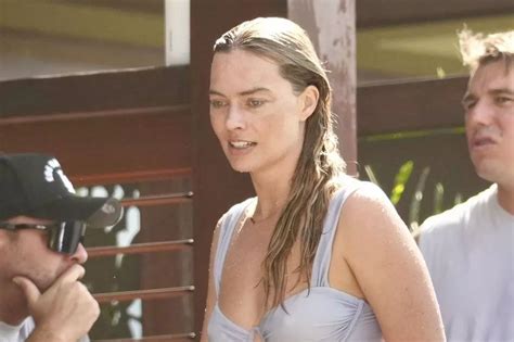 Margot Robbie Soaks Up Sun In Bikini Beach Snaps Wearing Sweet Nod To