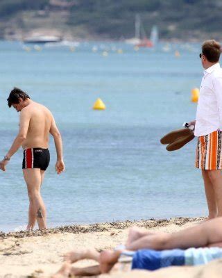 Busty Geri Halliwell Showing Pokies In Skimpy Orange Bikini At Club 55 Beach In Porn Pictures