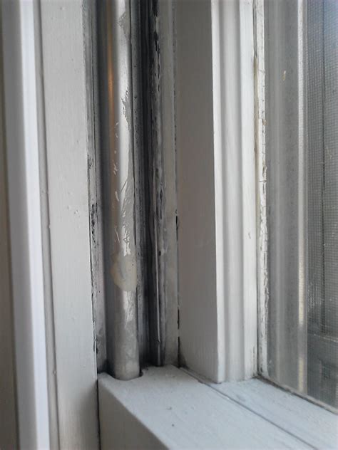 How can I remove paint from this window's aluminum track? - Home