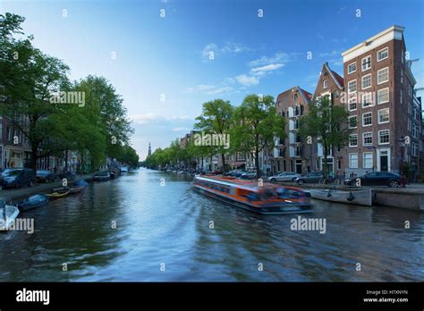 Cruise boat on Prinsengracht canal, Amsterdam, Netherlands Stock Photo ...