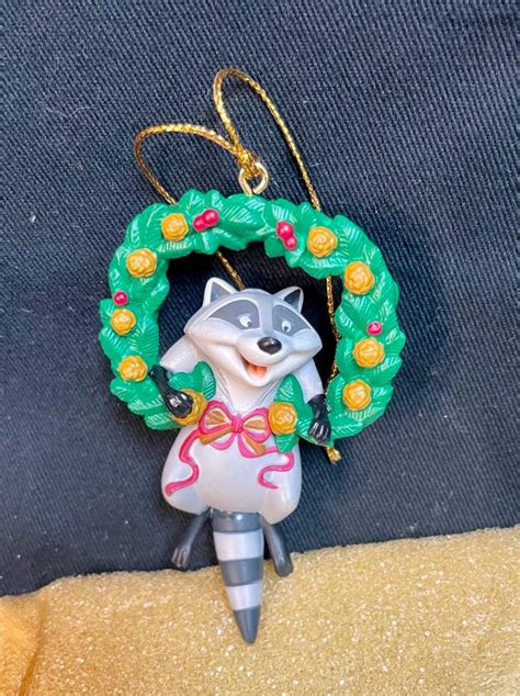 Disney Meeko Raccoon in Wreath Christmas Ornament | EstateSales.org
