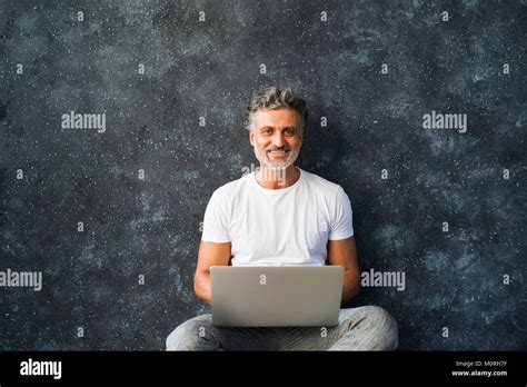 Mature Man Using Laptop Stock Photo Alamy