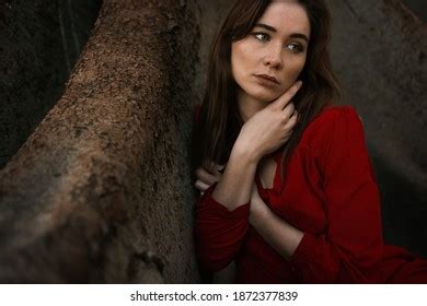 Sensual Brunette Wearing Red Dress Sitting Stock Photo 1872377839 Shutterstock