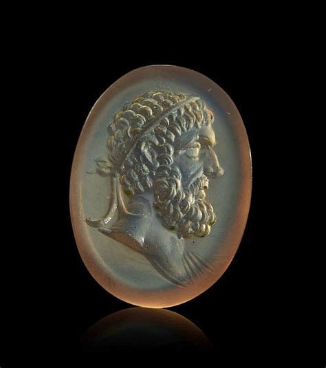 Sold At Auction A ROMAN INTAGLIO WITH HEAD OF HERCULES CIRCA 2ND 3RD