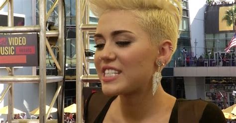 Miley Cyrus Poses Nude For Charity