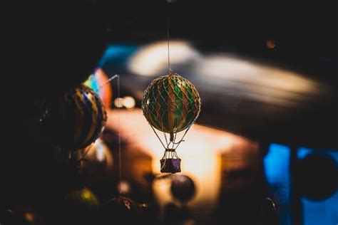 Premium Photo Beautiful Bokeh Of A Small Hot Air Balloon Toy Hanging