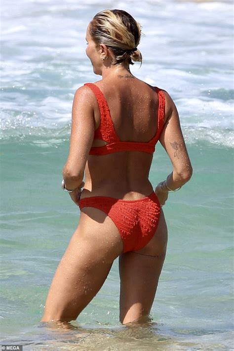 Pip Edwards Shows Off Her Bikini Body On Bondi Beach As She Splashes In The Sea With Her Male