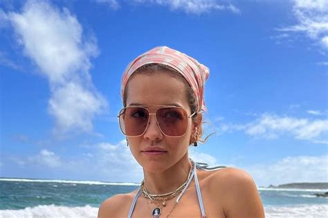 The Masked Singer S Rita Ora Showcases Washboard Abs As She Strips To Tiny Bikini Daily Star