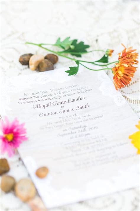 Naked Wedding Cake With Ranunculus Eucalyptus