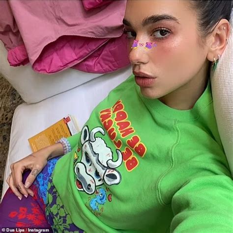 Dua Lipa Flashes Her Abs In Bikini Snaps As She Lounges By The Water