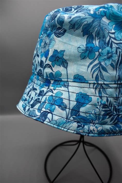 floral reversible bucket hat blue  color   range  sizes