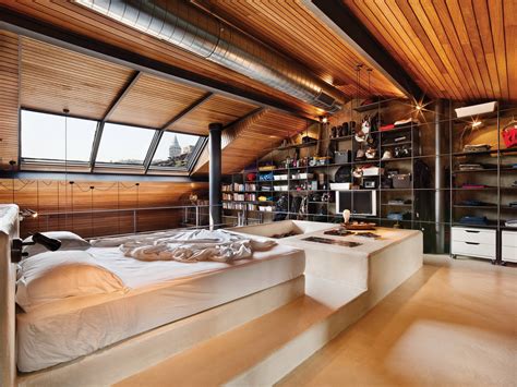 Loft Bedroom With Wood Panel Ceiling And Skylights Located In Istanbul