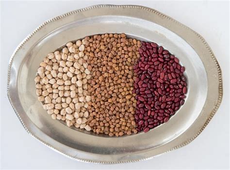 Premium Photo Overhead Shot Of Raw Dal Or Lentil Seeds In A Silver Tray