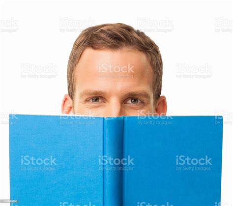 Man Hiding Face Behind Book Isolated Stock Photo Download Image Now