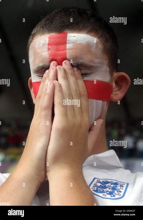 England fans react as they lose on penalties during the UEFA Euro 2012 ...