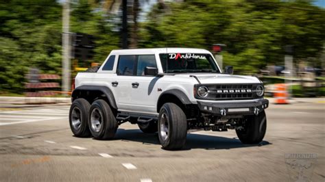 Apocalypse Dark Horse is a Ford Bronco with six wheels and a lift kit ...