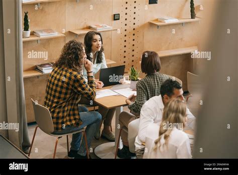 Gorgeous Brunette Girl Confronting Her Female Colleague At Work Stock Photo Alamy