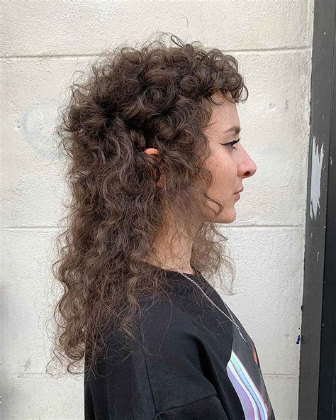 Stylists are debating if the short curly mullet is here to stay 9