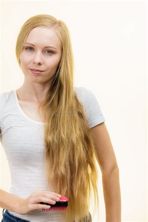 Blonde Girl Brushing Her Long Hair Stock Photo Image Of Girl Comb 167337506