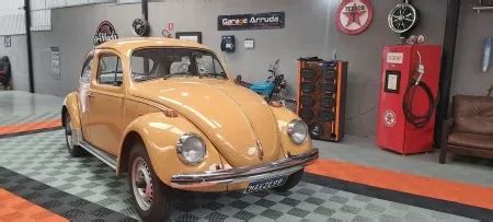 Geraldo Arruda Ação entre amigos FUSCA 78 1300L MARROM SAVEIRO PLACA