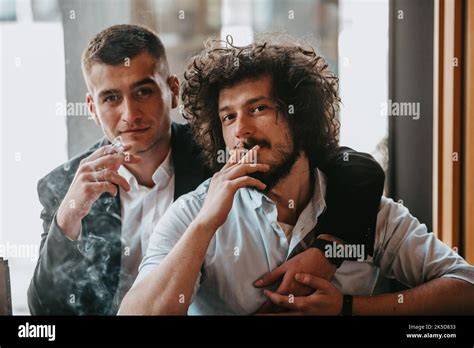 Portrait Of Multiethnic Diverse Gay LGBT Romantic Male Couple Embracing And Showing Their Love