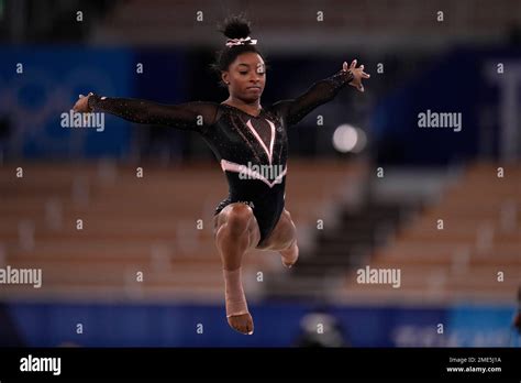 Simone Biles Of The United State Trains On The Floor Exercise During