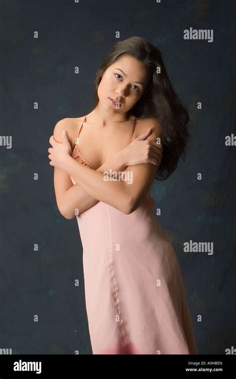 Brunette Model In Pink Dress Stock Photo Alamy