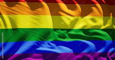 Rainbow LGBT Pride Flag Waving In Wind Realistic Gay Fabric Background International Day
