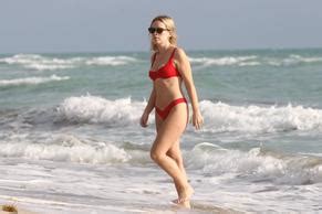 Tanya Burr Sexy In Miami Wearing A Red Two Piece Bikini AZNude