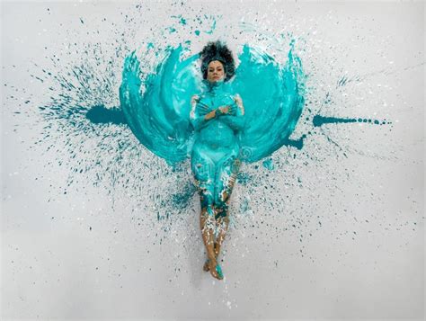 Expressive Woman Lies Naked Elegant On The Floor In Turquoise Blue Color Abstract Painted