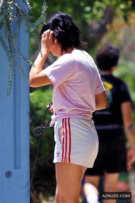 Camila Mendes Displays Her Latina Power While Out Taking Her Pooch For A Stroll In Los Angeles