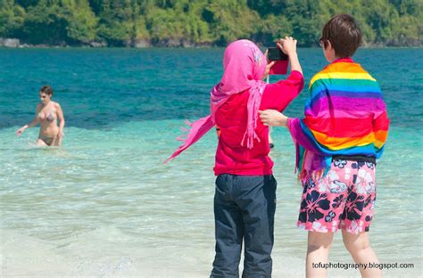 Tofu Photography Muslim Woman And A Bikini Clad Woman