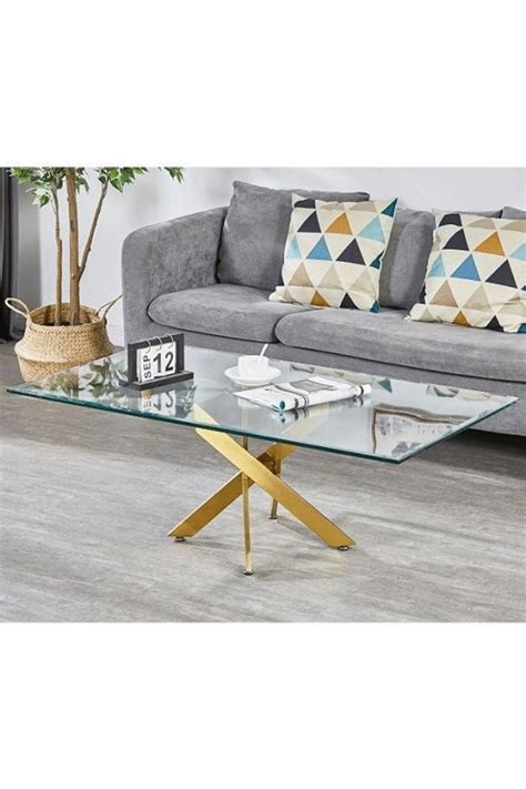glass top coffee table  gold legs  mitchell cushing blog