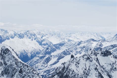 Birds Eye View of Snow Covered Mountains · Free Stock Photo