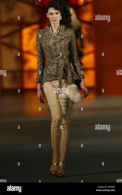 Raphael Lopez London Autumn Winter Model Brunette Hair Off Face Wearing Brown And Black Jacket