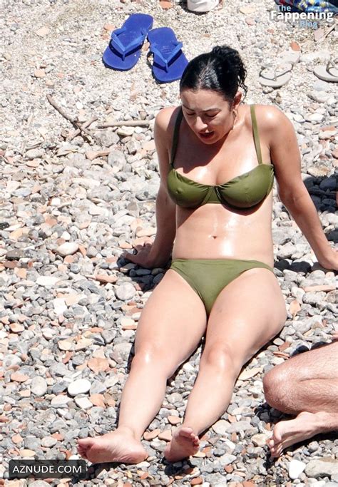 Charli Xcx Sizzles In The Italian Sun In Her Sexy Skimpy Green Bikini
