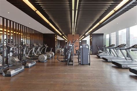 The Puli Hotel And Spa, Shanghai, Gym | Gym room, Home gym decor, Home ...