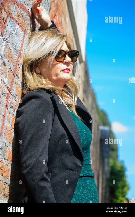 Mature Blonde Woman With Sunglasses Posing Stock Photo Alamy