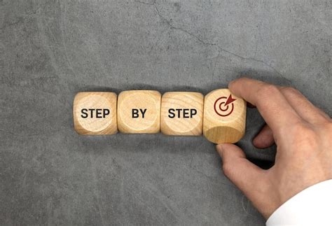 premium photo  word step  step  wooden cubes achievement