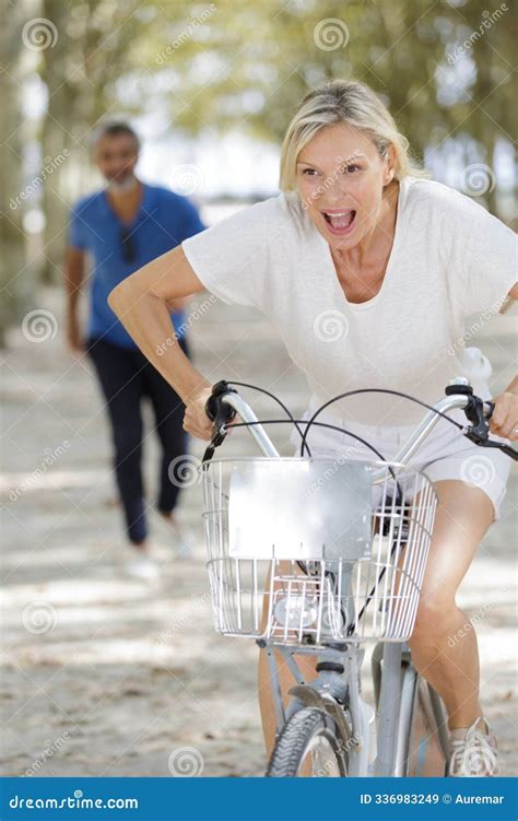 Happy Mature Woman Riding Bicycle At Summer Park Stock Image Image Of Couple Bicycle