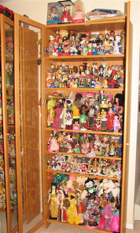 Right cabinet with doll collection by lovebiser on DeviantArt