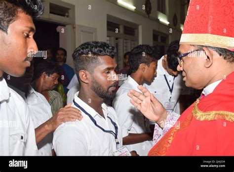 Catholic Bishop Is Giving Confirmation Sacrament Stock Photo Alamy