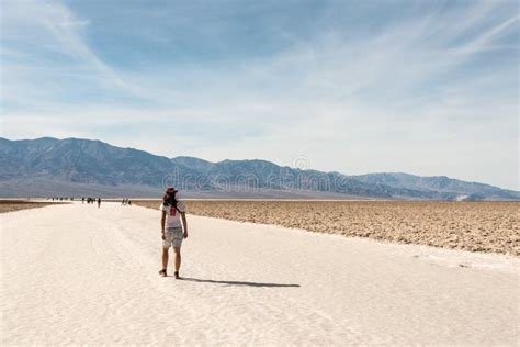 A Lonely Person Hiking through Famous Badwater Basin in the Death ...