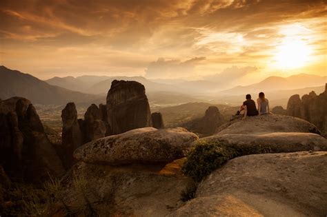 Premium Photo | Meteora Monasteries on the sunset Beautiful tourist in ...