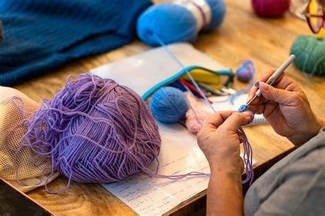 Premium Photo Crochet Club Closeup Of An Elderly Woman S Hands Knitting